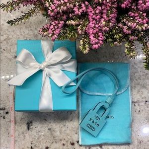 Tiffany & Co Leather Bag charm. Lock shape